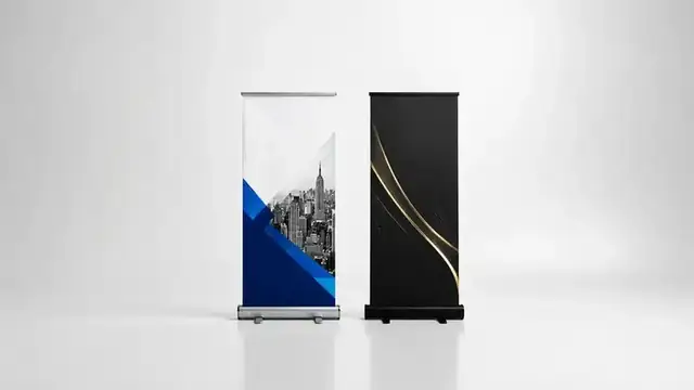 Roll up standees with silver and black bases for display advertising